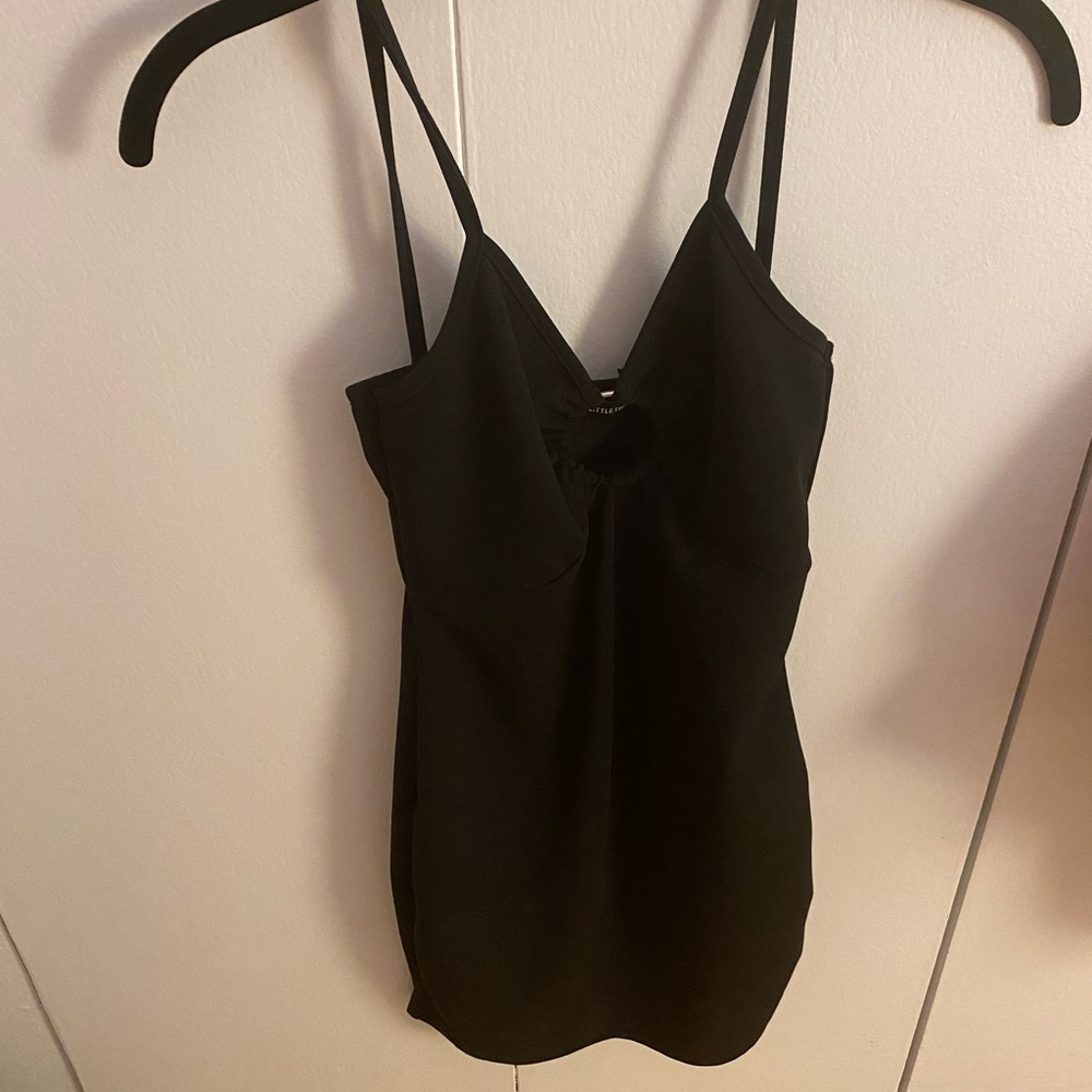 Black mini dress with silver ring in the center